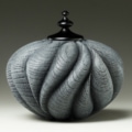 Bella - 5 1/2” x 5 1/2” - Oak vessel, turned, sandblasted and painted. Maple finial, turned and dyed black.