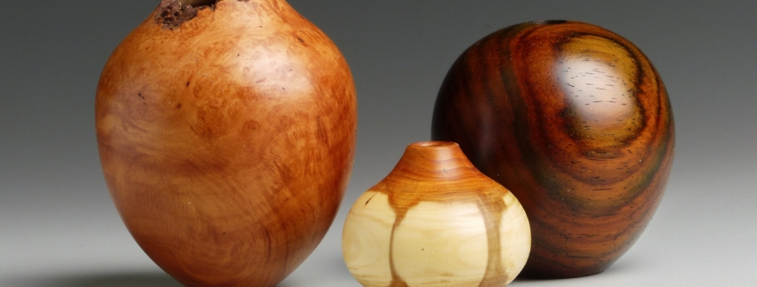Briar burl, Pacific Yew, and Cocobolo miniatures - tallest is 1 3/4” high