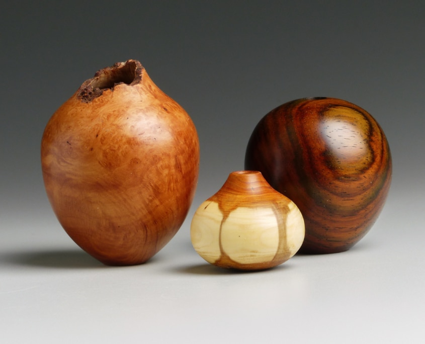 Briar burl, Pacific Yew, and Cocobolo miniatures - tallest is 1 3/4” high