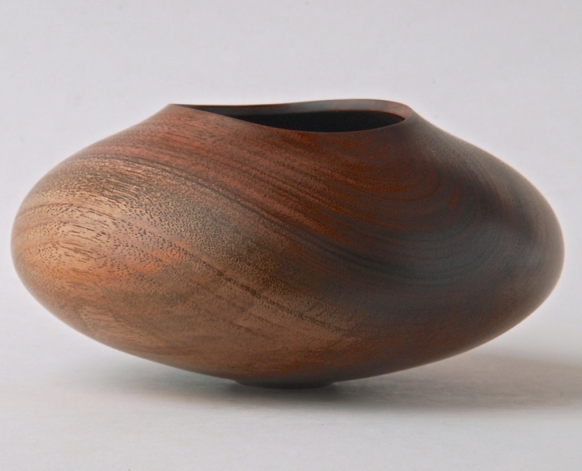 Black Walnut Vessel - 5 1/2”w x 2 3/4”h Turned, hollowed and carved rim.